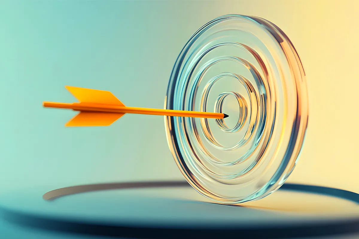 Gerendertes Bild von einem gelben Pfeil, der in der Mitte durch gläserne Ringe fliegt